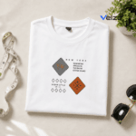 folded white t-shirt with New York urban graphic design flat lay